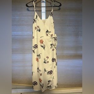 Never been worn, white flowered dress.